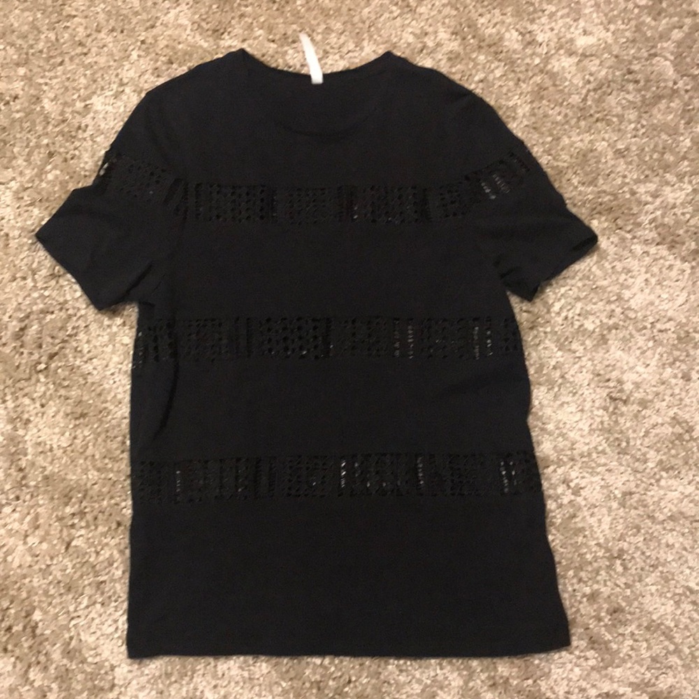 Black shirt.